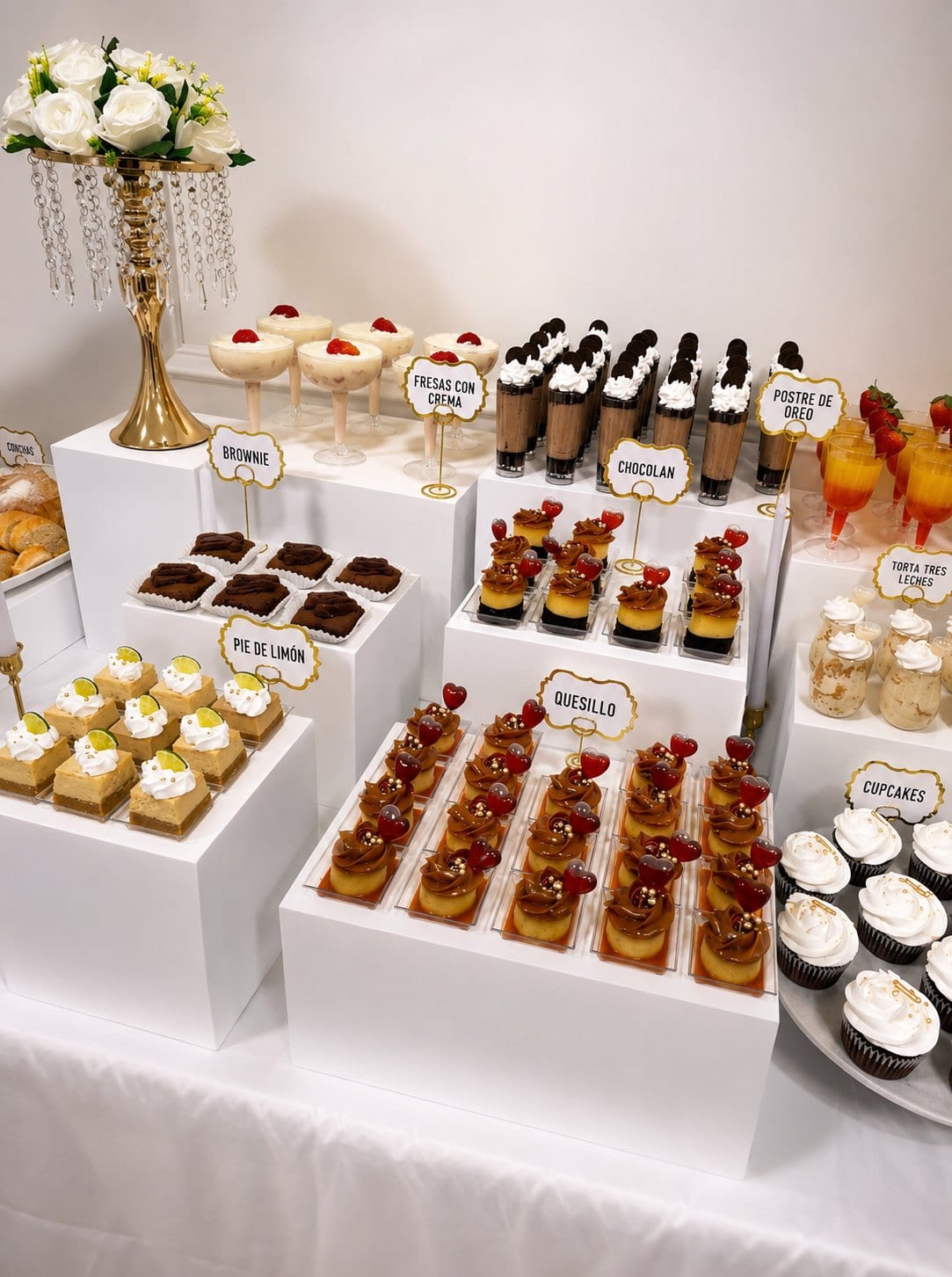 Dessert table with cupcakes and mini desserts