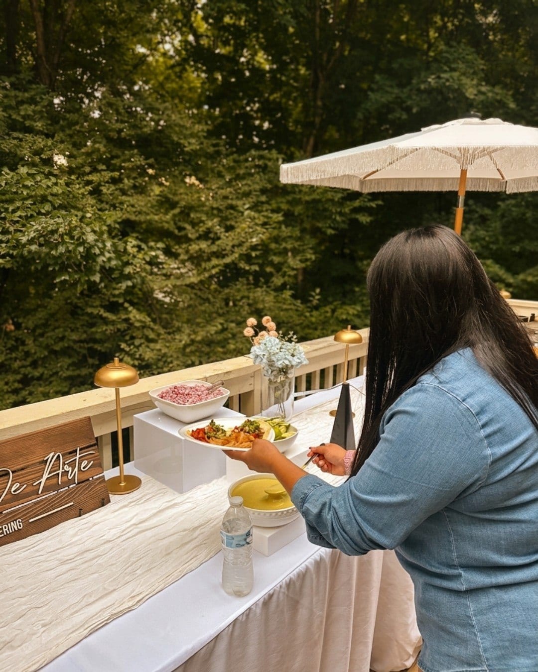Guest at an outdoor deck buffet