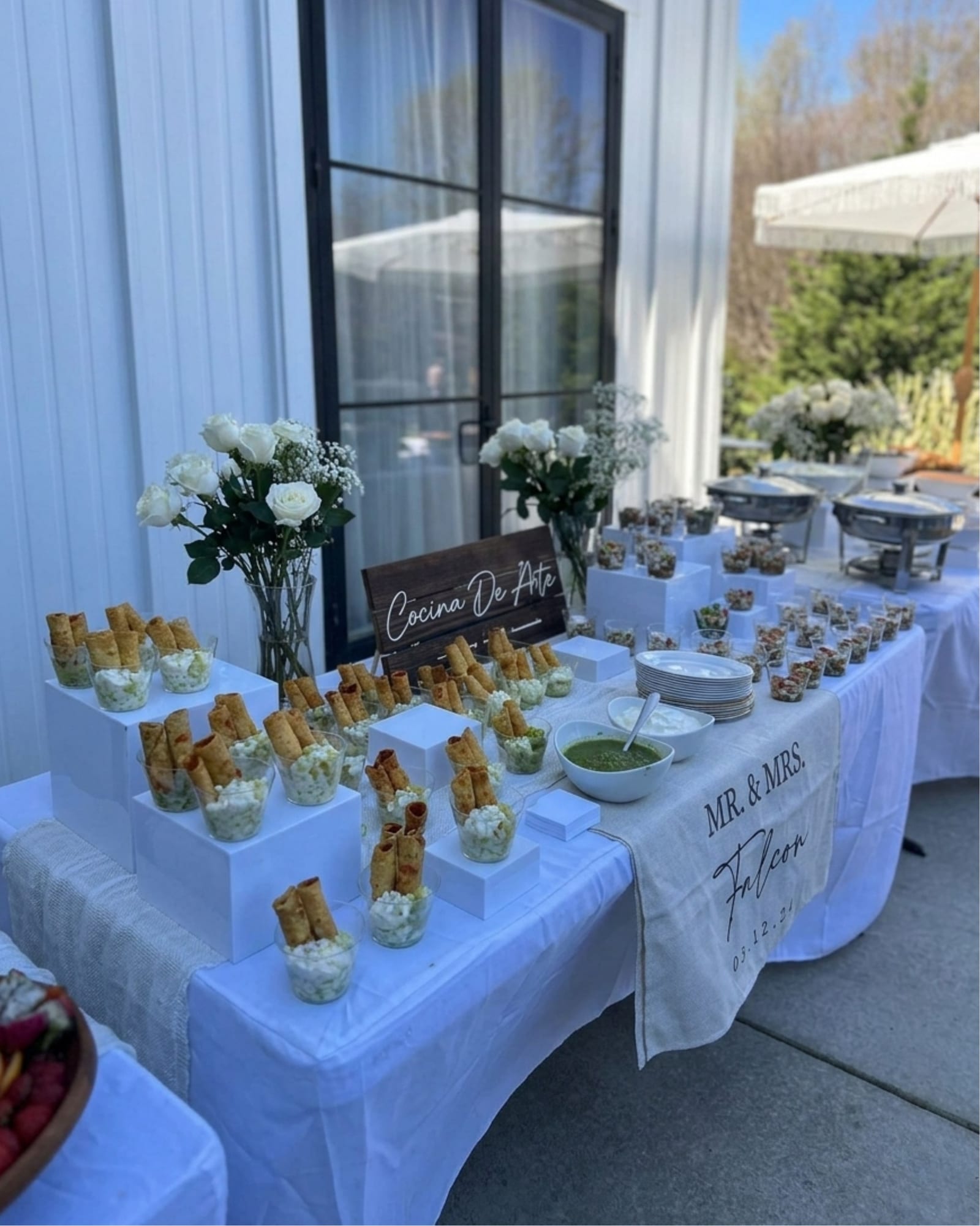 Wedding appetizer table with a Mr. & Mrs. sign